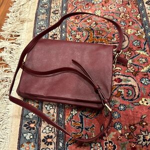 Burgundy crossbody bag with detachable strap